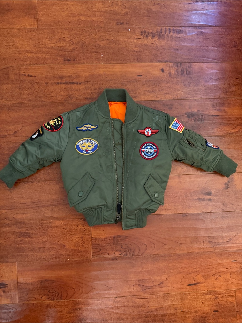 Alpha Industries Kids Olive Green Puffer Jacket with Orange Lining and Patches